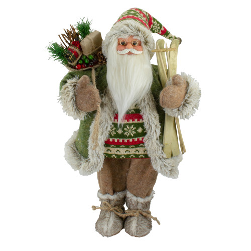 18"Standing Santa Christmas Figure Carrying Skis and Presents - IMAGE 1
