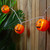 10-Count Orange Jack-O-Lantern Paper Lantern Halloween Lights, 8.5ft White Wire - IMAGE 2