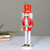 14" Red and White Wooden Christmas Nutcracker with Horn - IMAGE 3
