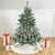 4.5' Pre-Lit Full Flocked Natural Emerald Artificial Christmas Tree - Warm Clear Lights - IMAGE 1