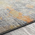 3.9' x 5.5' Distressed Orange and White Rectangular Area Throw Rug