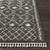 9'2" x 12' Scandinavian Design Black and Beige Rectangular Machine Woven Area Rug