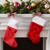 Traditional Christmas Stocking with Black Paw Prints  - 14"- Red and White - IMAGE 1