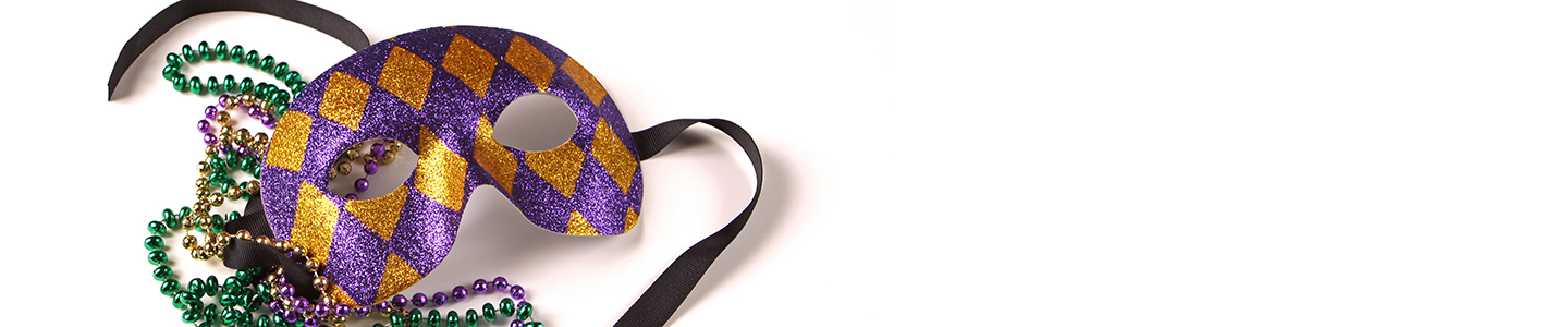 purple and gold harlequin patterned mask with green, gold and purple Mardi Gras beads