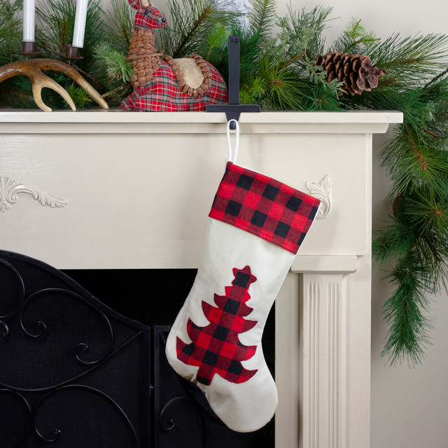 cream stocking with red and black buffalo plaid cuff and cutout Christmas tree