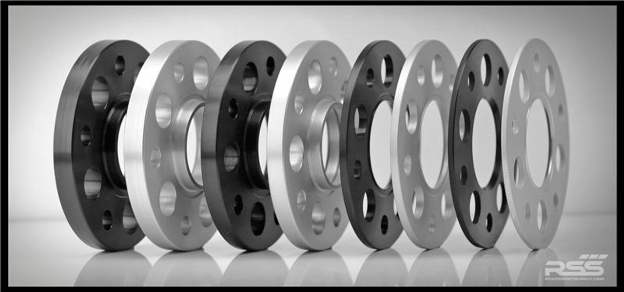 • All RSS Wheel Spacer Kits Come In Pairs, Include Locating Pin & Longer Wheel Bolts Where Applicable
• Fitments for Most Late Model Porsche Vehicles Including the Newest 981 & 991
• Available in 5mm, 7mm, 15mm & 18mm Sizes
• Hubcentric Design Where Applicable
• Most Kits Available in Silver or Black with Matching Silver or Black Wheel Bolts
• NEW for 2013 – Combination Finish: Silver Spacers with Black Wheel Bolts (Currently Available In Most Popular Sizes 7mm & 15mm Only)
• Made at RSS in the USA with Premium Grade Materials
• Satisfaction & Fitment Guaranteed • All RSS Wheel Spacer Kits Come In Pairs, Include Locating Pin & Longer Wheel Bolts Where Applicable
• Fitments for Most Late Model Porsche Vehicles Including the Newest 981 & 991
• Available in 5mm, 7mm, 15mm & 18mm Sizes
• Hubcentric Design Where Applicable
• Most Kits Available in Silver or Black with Matching Silver or Black Wheel Bolts
• NEW for 2013 – Combination Finish: Silver Spacers with Black Wheel Bolts (Currently Available In Most Popular Sizes 7mm & 15mm Only)
• Made at RSS in the USA with Premium Grade Materials
• Satisfaction & Fitment Guaranteed