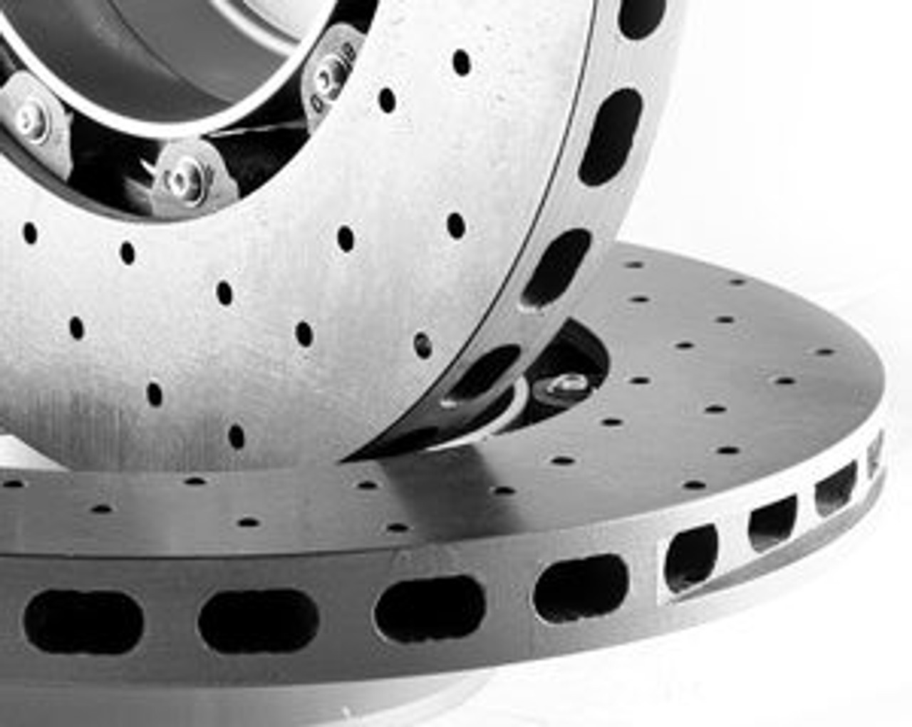 CCST Carbon Ceramic  Brake Rotor Kit - 991 Turbo with Track Pads:

STK.10.374.386 - Kit Consists of:

- CCST Fully Assembled 2-Piece Rotor/Discs:  410mm x 36mm (F) x 2 + 400mm x 32mm (R) x 2

- Mouning Kit:Brake lines for larger diameter disc (OE Porsche parts)

- Track Pads Set Front and Rear

- Includes Free Shipping: In stock kits usually ship same day or within 48 hours.

 

RSS is proud to bring you the latest in Carbon Ceramic Brake Rotor Technology. CCST (Carbon Ceramic Surface Transform) Carbon Brake Discs are direct upgrade/replacement for Porsche PCCB and Porsche Steel Disc Brake Rotors.

CCST Carbon Ceramic Discs feature next generation “Continuous Fiber Construction” - Patented Processvs Traditional Chopped Fiber Construction. Manufactured in the United Kingdom at ISO/TS16494 certified facilities and are strictly controlled to the highest standards.

CCST Discs are the choice of OEM Partners and Super Car / Hyper Car Manufactures such as: Aston Martin, Mono, Koenigsegg, Singer Vehicle Design in addition to several other OEM’s who prefer anonymity. CCST rotors provide the ultimate in braking technology for motorsport such as the European Ferrari 458 Challenge, road-going hyper-cars and super-cars.

CCST Kits - Now Available for Porsche

•Porsche 981 Cayman GT4

•Porsche 991 GT3

•Porsche 991 GT3 RS

•Porsche 991 Turbo

•Porsche 991 Turbo S

•Porsche 991 Turbo

•Porsche 997 GT2

•Porsche 997 GT3

•Porsche 997 GT3 RS

•Porsche 997 Turbo

(993 Turbo Coming Soon!)

CCST - Carbon Ceramic Rotors vs. OEM – PCCB Carbon Ceramic Brakes & Current Generation Ceramic Rotors

PERFORMANCE + VALUE:

- Temperature Reductions of up to 150 Degrees Celsius/302 Degrees Fahrenheit

- Up to 3x thermal conductivity of current generation Carbon-Ceramic Matrix Discs (CCM)

- Weight Savings of up to 70% over Iron brakes

- 10x lifespan improvement vs current generation CCM Discs

- Better Vehicle Dynamics, improved handling and drivability

- Reduction in Noise, Vibration Harshness, vs. CCN or Steel Rotors

- Unrivaled Performance from Cold

- Refurbish CCST’s up to 3 times, vastly reducing cost of ownership

REFURBISHMENT:

Unlike traditional chopped-fibre CCM discs, our next-generation continuous fibre construction of the CCST discs allow for refurbishing the discs up to three (3) times when traditional chopped-fibre CCM discs would need to be thrown away.

The refurbishment process starts with a full disassembly of the discs followed by a thorough inspection of all parts. The disassembled rotors and hats will then be refurbished and reassembled using completely new hardware.

Refurbishing of a pair of disc assemblies (rotor, bells/hats, bobbins, etc.) starts at 900 USD plus applicable shipping fees. Cost includes disassembly, new hardware and reassembly.

NOTE: There will be some instances where rotors cannot be refurbished, due to technical requirements and tolerances. In such instances, we will contact you to discuss how to progress.

CCST Kits Include:

All OE Replacement and OE Upgrade kits consist of:

•Assembled 2-piece discs (rotors + bell/hat)      

•Brake pads in either Pagid RSC1 (street/track) or Pagid RS29 (track only) compounds

•Any necessary hardware required to easily fit the kit onto the car.

**CCST come with a 1 year limited warranty for the original purchaser