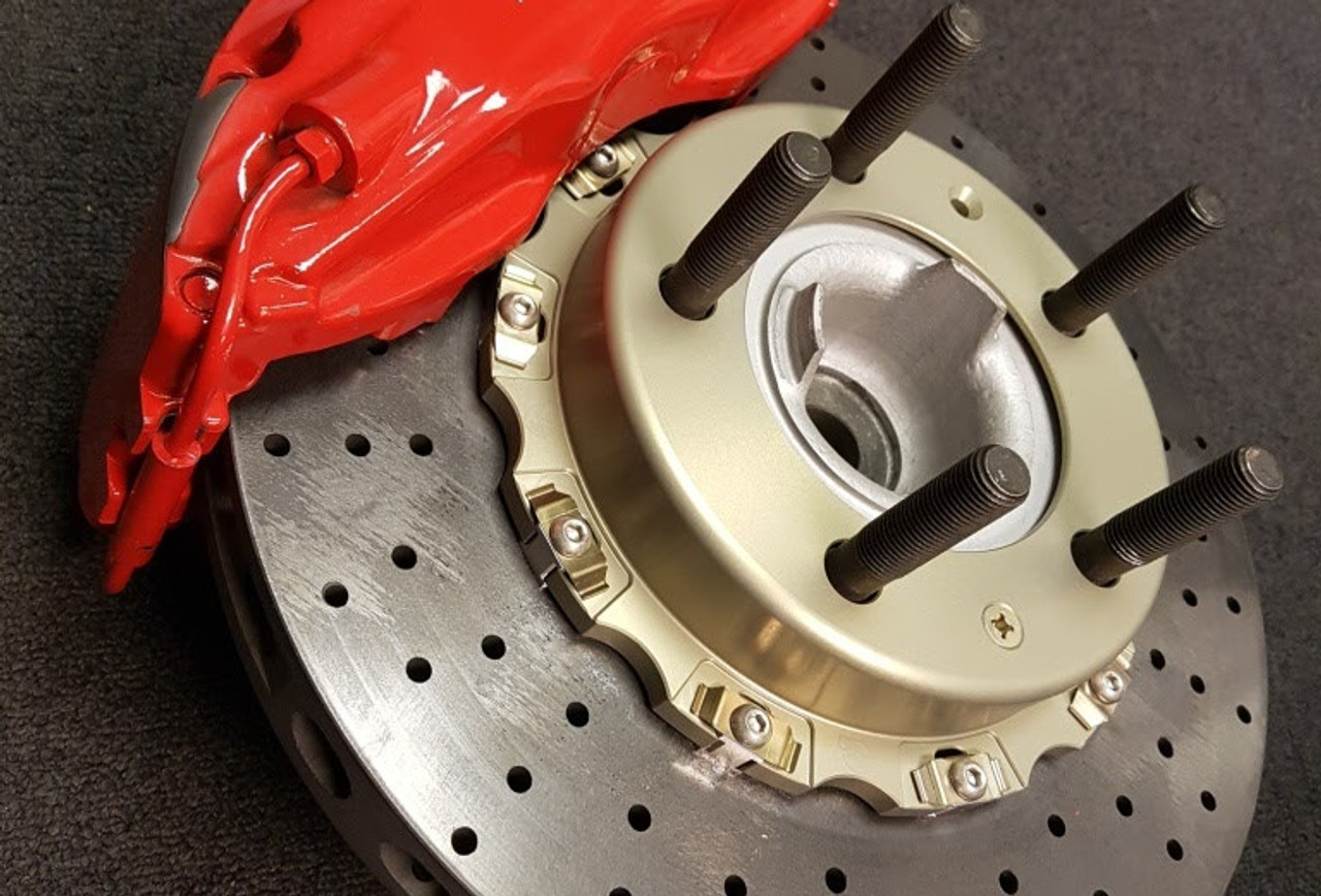 CCST Carbon Ceramic  Brake Rotor Kit - 991 GT3/RS - Red Caliper -  with Track Pads:

STK.10.244.256- Kit Consists of:

- CCST Fully Assembled 2-Piece Rotor/Discs:  410mm x 36mm (F) x 2 + 400mm x 32mm (R) x 2

- Mouning Kit:Brake lines for larger diameter disc (OE Porsche parts)

- Brake Pad Set Front and Rear

- Includes Free Shipping in Continental / USA. In stock kits usually ship same day or within 48 hours.

 

RSS is proud to bring you the latest in Carbon Ceramic Brake Rotor Technology. CCST (Carbon Ceramic Surface Transform) Carbon Brake Discs are direct upgrade/replacement for Porsche PCCB and Porsche Steel Disc Brake Rotors.

CCST Carbon Ceramic Discs feature next generation “Continuous Fiber Construction” - Patented Processvs Traditional Chopped Fiber Construction. Manufactured in the United Kingdom at ISO/TS16494 certified facilities and are strictly controlled to the highest standards.

CCST Discs are the choice of OEM Partners and Super Car / Hyper Car Manufactures such as: Aston Martin, Mono, Koenigsegg, Singer Vehicle Design in addition to several other OEM’s who prefer anonymity. CCST rotors provide the ultimate in braking technology for motorsport such as the European Ferrari 458 Challenge, road-going hyper-cars and super-cars.

CCST Kits - Now Available for Porsche

•Porsche 981 Cayman GT4

•Porsche 991 GT3

•Porsche 991 GT3 RS

•Porsche 991 Turbo

•Porsche 991 Turbo S

•Porsche 991 Turbo

•Porsche 997 GT2

•Porsche 997 GT3

•Porsche 997 GT3 RS

•Porsche 997 Turbo

(993 Turbo Coming Soon!)

CCST - Carbon Ceramic Rotors vs. OEM – PCCB Carbon Ceramic Brakes & Current Generation Ceramic Rotors

PERFORMANCE + VALUE:

- Temperature Reductions of up to 150 Degrees Celsius/302 Degrees Fahrenheit

- Up to 3x thermal conductivity of current generation Carbon-Ceramic Matrix Discs (CCM)

- Weight Savings of up to 70% over Iron brakes

- 10x lifespan improvement vs current generation CCM Discs

- Better Vehicle Dynamics, improved handling and drivability

- Reduction in Noise, Vibration Harshness, vs. CCN or Steel Rotors

- Unrivaled Performance from Cold

- Refurbish CCST’s up to 3 times, vastly reducing cost of ownership

REFURBISHMENT:

Unlike traditional chopped-fibre CCM discs, our next-generation continuous fibre construction of the CCST discs allow for refurbishing the discs up to three (3) times when traditional chopped-fibre CCM discs would need to be thrown away.

The refurbishment process starts with a full disassembly of the discs followed by a thorough inspection of all parts. The disassembled rotors and hats will then be refurbished and reassembled using completely new hardware.

Refurbishing of a pair of disc assemblies (rotor, bells/hats, bobbins, etc.) starts at 900 USD plus applicable shipping fees. Cost includes disassembly, new hardware and reassembly.

NOTE: There will be some instances where rotors cannot be refurbished, due to technical requirements and tolerances. In such instances, we will contact you to discuss how to progress.

CCST Kits Include:

All OE Replacement and OE Upgrade kits consist of:

•Assembled 2-piece discs (rotors + bell/hat)      

•Brake pads in either Pagid RSC1 (street/track) or Pagid RS29 (track only) compounds

•Any necessary hardware required to easily fit the kit onto the car.

**CCST come with a 1 year limited warranty for the original purchaser

 