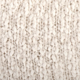 detail shot of chunky white loosely knit yarn