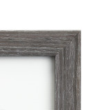 The corner of a gray wooden frame.