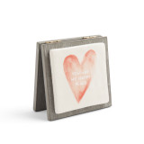 A gray wooden card with a ceramic plate that reads "You are my happy place".