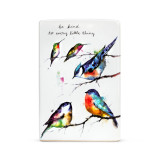 A white ceramic plaque with five painted birds on tree branches and "be kind to every little thing" in black cursive font.