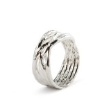 An upright view of a silver intertwined adjustable ring on a white background.