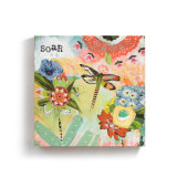 A square wall art piece with a dragonfly surrounded by colorful flowers that says "soar".