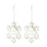 Set of two white snowflake shaped ornaments that say "in my heart" and have a metal tag that says "Always", displayed angled to the left.