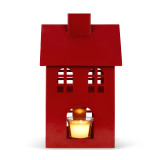 Red metal house shaped lantern with a space in the bottom for a small candle.