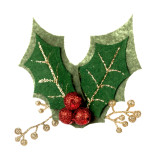 Green holly shaped fabric lapel pin embellished with red berries and gold stems, displayed angled to the left.