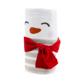 White and cream knit blanket with the face of a snowman rolled with the face on the outside and tied with a red scarf, displayed angled to the left.