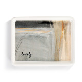 A white ceramic mini tray with artwork created by ArtLifting artist Charlie French. The image is gray with black at the top and brown to the right. The bottom left says "lovely".