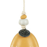 Detail view of the beads on a mini dark yellow and cream bell with the saying "find sunshine". There are beads and a metal token at the top of the bell.