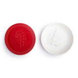 Two mini ceramic cookie plates each with a scalloped edge. One is red with a candy cane and the other is white with a Christmas tree.