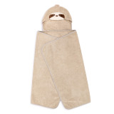A light brown terrycloth towel with a hood that has the face of a sloth.