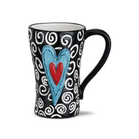 Tall black ceramic mug with white swirls and a raised red and blue heart on the front.