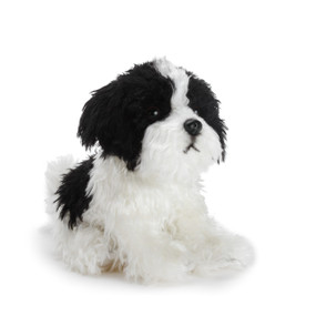 Small white/black stuffed dog animal sitting up