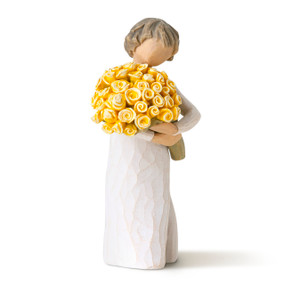 Front view of little girl with short brown hair holding a large bouquet of yellow roses