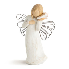 Front view of female angel with wire wings in cream dress, holding pink shell up to ear
