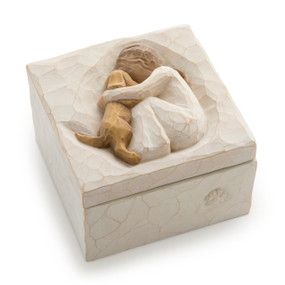 Cream square box with lid; bas-relief carving on lid of seated girl holding golden dog
