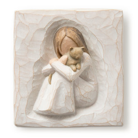 Flat square cream-colored plaque with bas-relief carving of seated girl holding gray cat