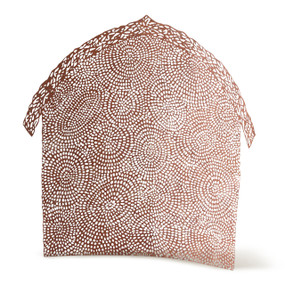 Shelter-shaped, flat, rust-colored pierced-metal backdrop patterned with branches and swirling circles of dots