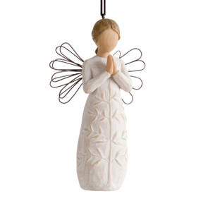 Female figure with wire wings in cream dress carved with a tree design, holding hands in prayer, ornament loop attached to head