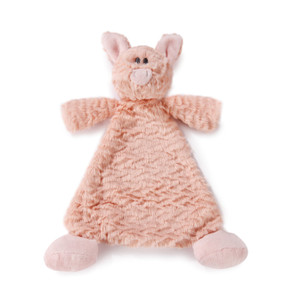 Stuffed pink pig spread out blanket