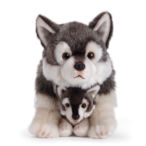 Large husky dog stuffed animal hovering over baby one