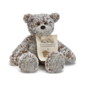 Front view. Mini Giving Bear's fur is brown with a white tinge. His stomach, muzzle, and bottoms of feet are white. A cream note has a message and an image in brown.