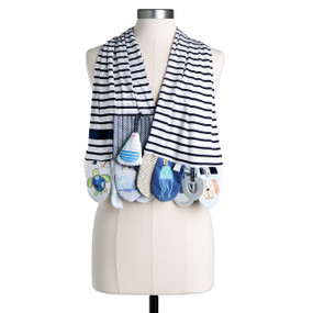 Dark blue striped "Mommy and Me" activity scarf with hanging sensory objects all in sea theme. Placed on a mannequin stand.