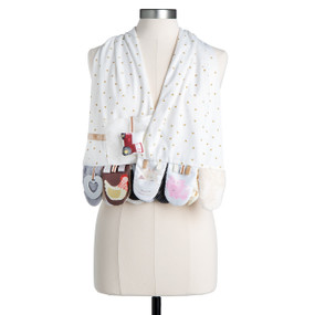 A cream baby activity scarf with different tabs and sensory activities on the ends all in a farm animal theme.