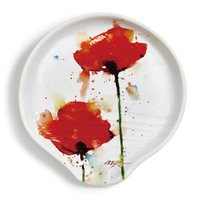 White platter with red flower designs and red artist signature in right corner