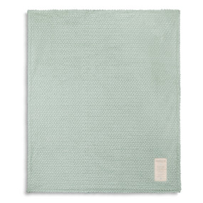 Light green towel laid out
