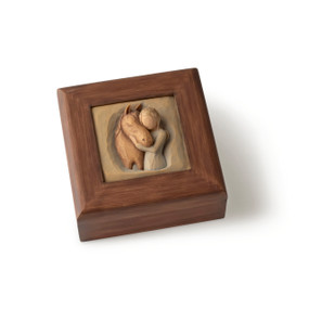 Dark brown square wood box with hinged lid, carving on lid of female in green dress, with arms embracing reddish-color horse