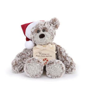 brown teddy bear wearing red Santa hat with DEMDACO tag reading Wishing you Peace, Love and Joy