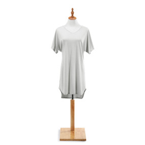A long size S/M pebble gray bamboo lounge shirt on a white and wooden mannequin.