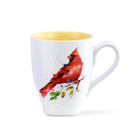 A white and yellow coffee mug with a spring cardinal painted on the front.