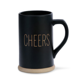 A tall black and tan beer stein that reads "cheers".