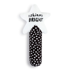 A black and white rattle with polka dots and a white star topper that reads "shine bright".