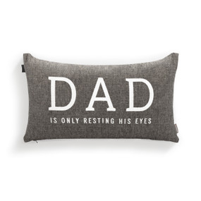 A rectangular gray pillow that says "DAD is only Resting His Eyes" in white.
