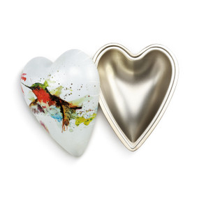 A white and gold art heart with a hummingbird painted on the top.