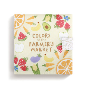 A farmer's market themed soft book with various fruits and vegetables on the cover.